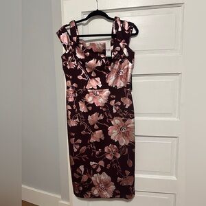 Brand new cocktail dress with shiny floral pattern!